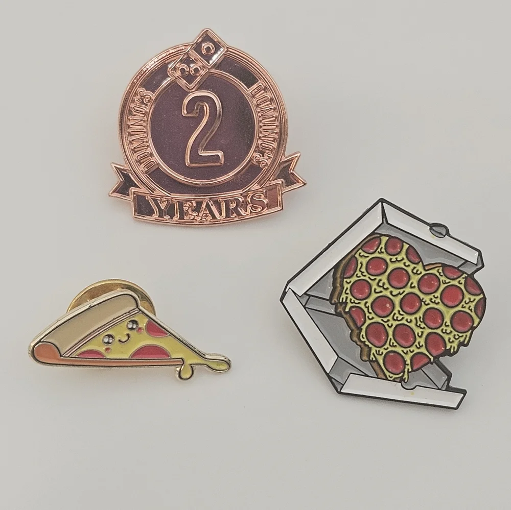 Domino's pizza pins, happy face pizza, heart-shaped pizza in box,and 2 yos pin